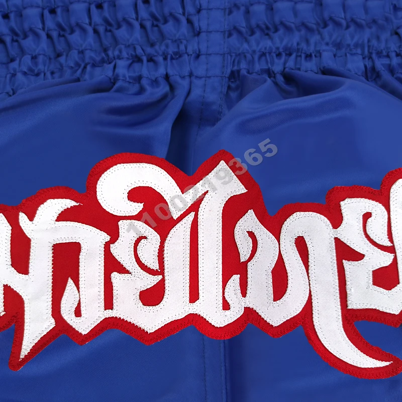 الملاكمة التايلاندية القتال كيك بوكسينغ السراويل الأزرق الرجال النساء الاطفال التايلاندية سراويل ملاكمة التطريز BJJ MMA Thaiboxing Muay Thay سروال التدريب