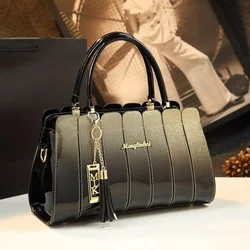 2026 New Genuine Leather Pillow Handbag Women Splicing Design Tassel Pendant Crossbody Shoulder Bag