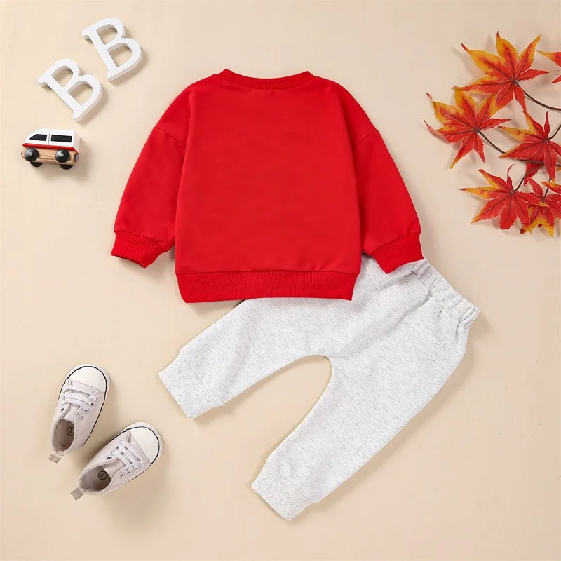 

Infant 2-Piece Holiday Ensemble with Cozy Long Sleeve Sweatshirt and Matching Trousers Featuring Embroidered Letters for