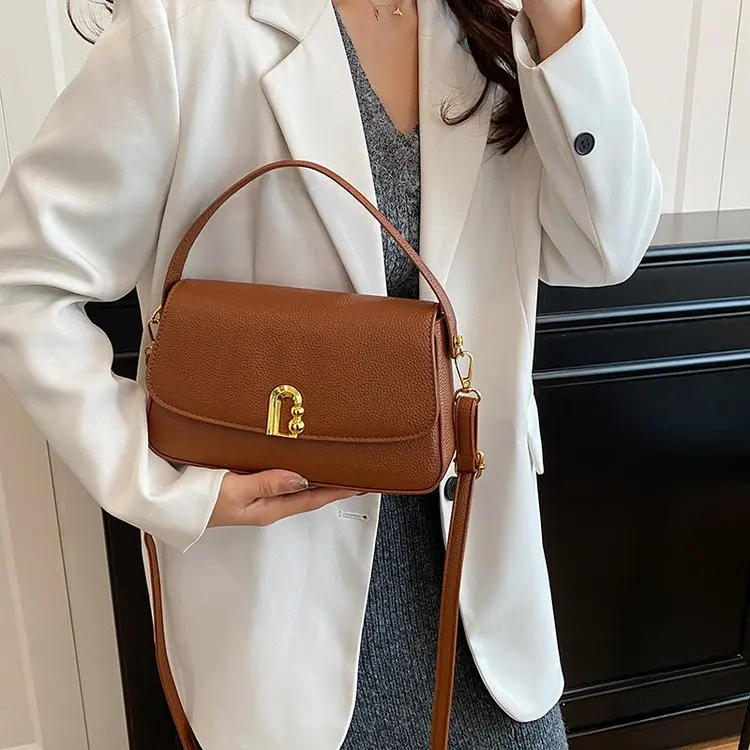 

Стильная минималистичная кожаная сумка-мессенджер для женщин, роскошная дизайнерская сумка через плечо, вместительная сумка для подгузников, элегантная сумка для поездок на работу.