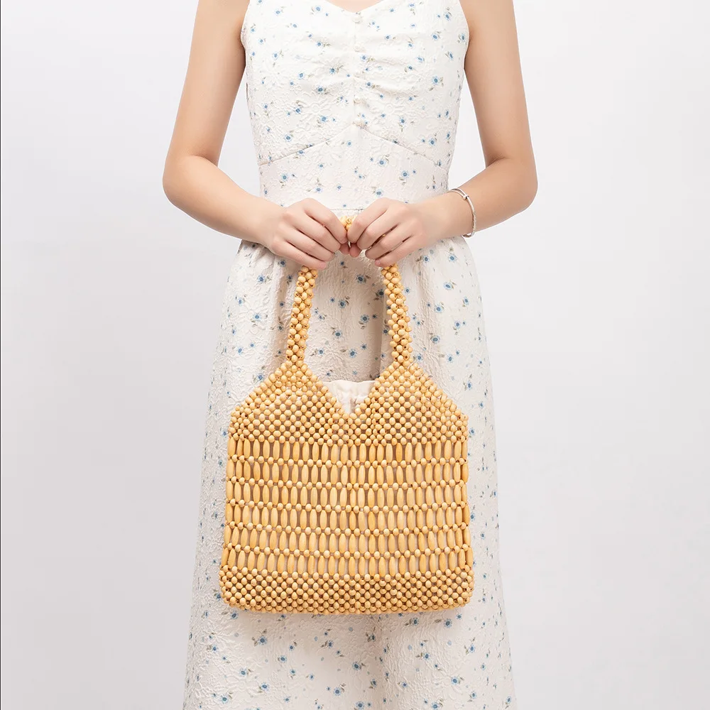 

2025 Новая модная женская сумка ручной работы с контрастными цветными деревянными бусинами для отдыха на море и элегантной пляжной сумки с признательными