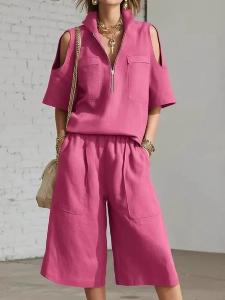 

Женский однотонный спортивный костюм-двойка: летний комплект с топом на молнии с вырезами на плечах и коротким рукавом, а также шортами. Идеально для отдыха.