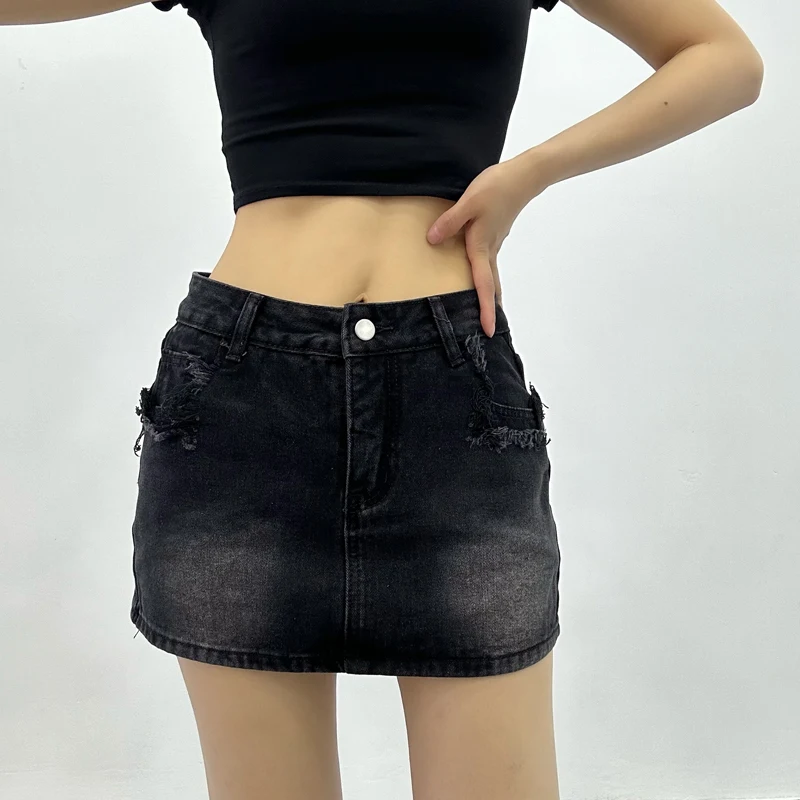 Neuer Stil Sommer würziges Mädchen niedrige Taille Denim Wrap Hüfte kurzen Rock Frauen Nische Design zerrissene Kanten personal isierte schlanke Minirock 4zzp