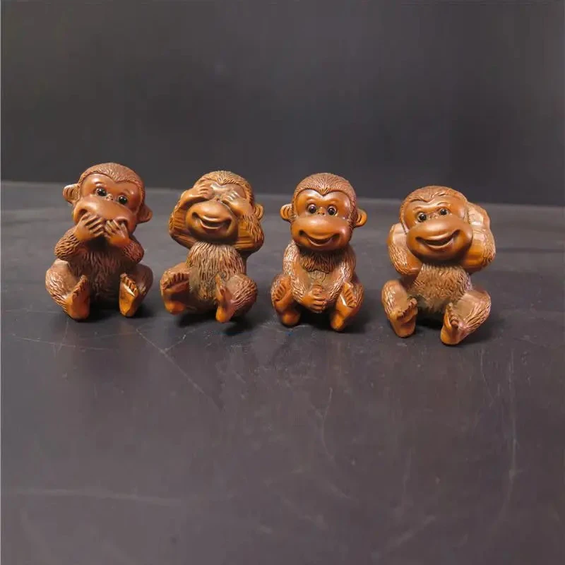 

Boxwood резьба четыре обезьяны в Китае я слышал плач, чтобы увидеть статую