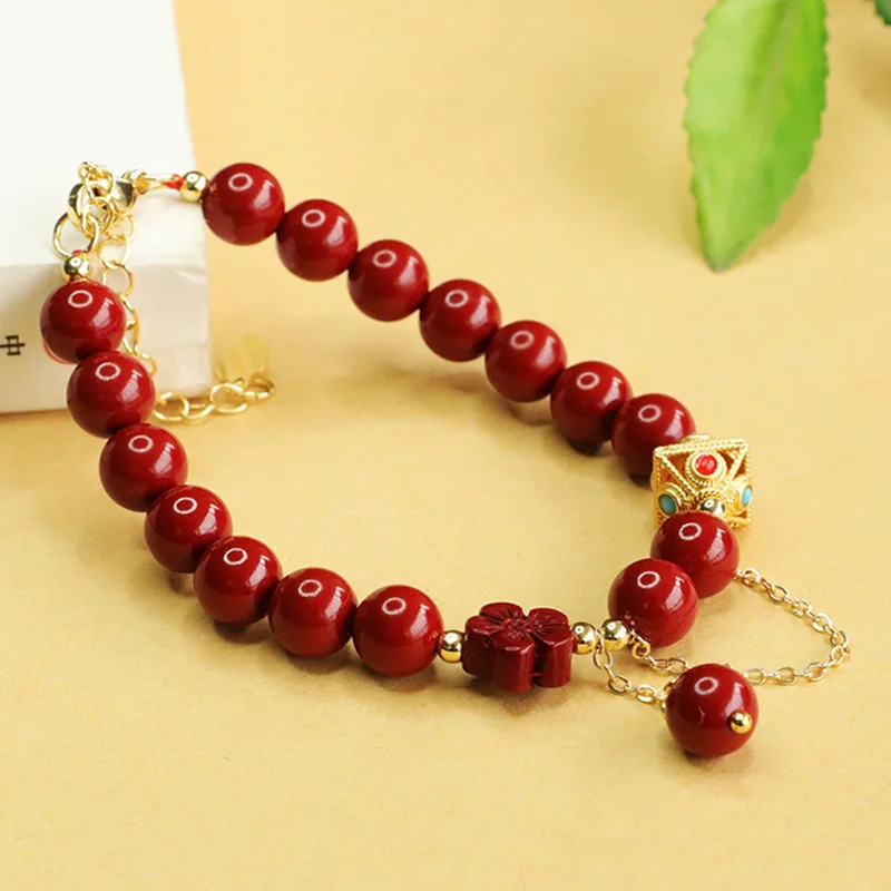 bracciale-in-cinabro-viola-con-fiori-in-sabbia-dorata-bracciale-antico