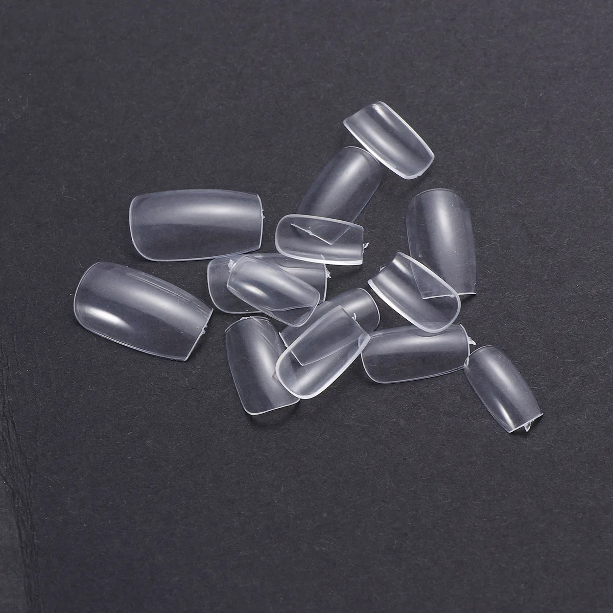 

100PCS Nail Tips Artificial False Fake Nails Tips Nail Art Supplies for Nail Salons and DIY Nail Art (Transparent)