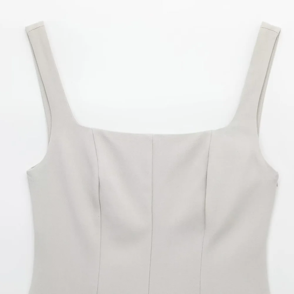 ชุดจั๊มสูทแฟชั่นใหม่สำหรับผู้หญิง คอเหลี่ยม สายเดี่ยว ไม่มีแขน มีกระเป๋าซิป เหมาะสำหรับฤดูใบไม้ผลิ/ฤดูร้อน