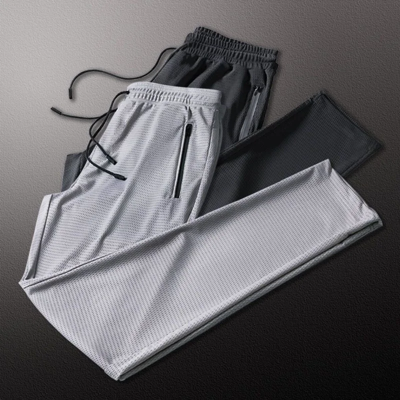 Pantaloni da pesca Mesh traspirante Quick Dry sottile pesca pantaloni corti da pesca estivi abbigliamento da pesca con cerniera per sport all'aria aperta da uomo