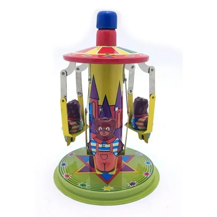 

Retro wind-up metal tin toy featuring clockwork bear amusement park enthusiasts Ideal vintage collectible or unique gift