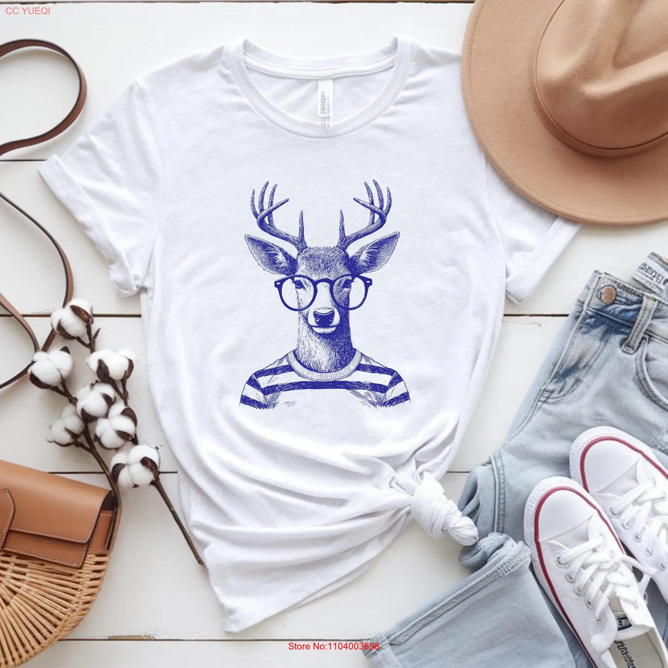 

Elegant Reindeer T Shirt Reading Lover with Nature Inspired Style for Animal Enthusiasts and Bookworms Classy Wildlife Farmer