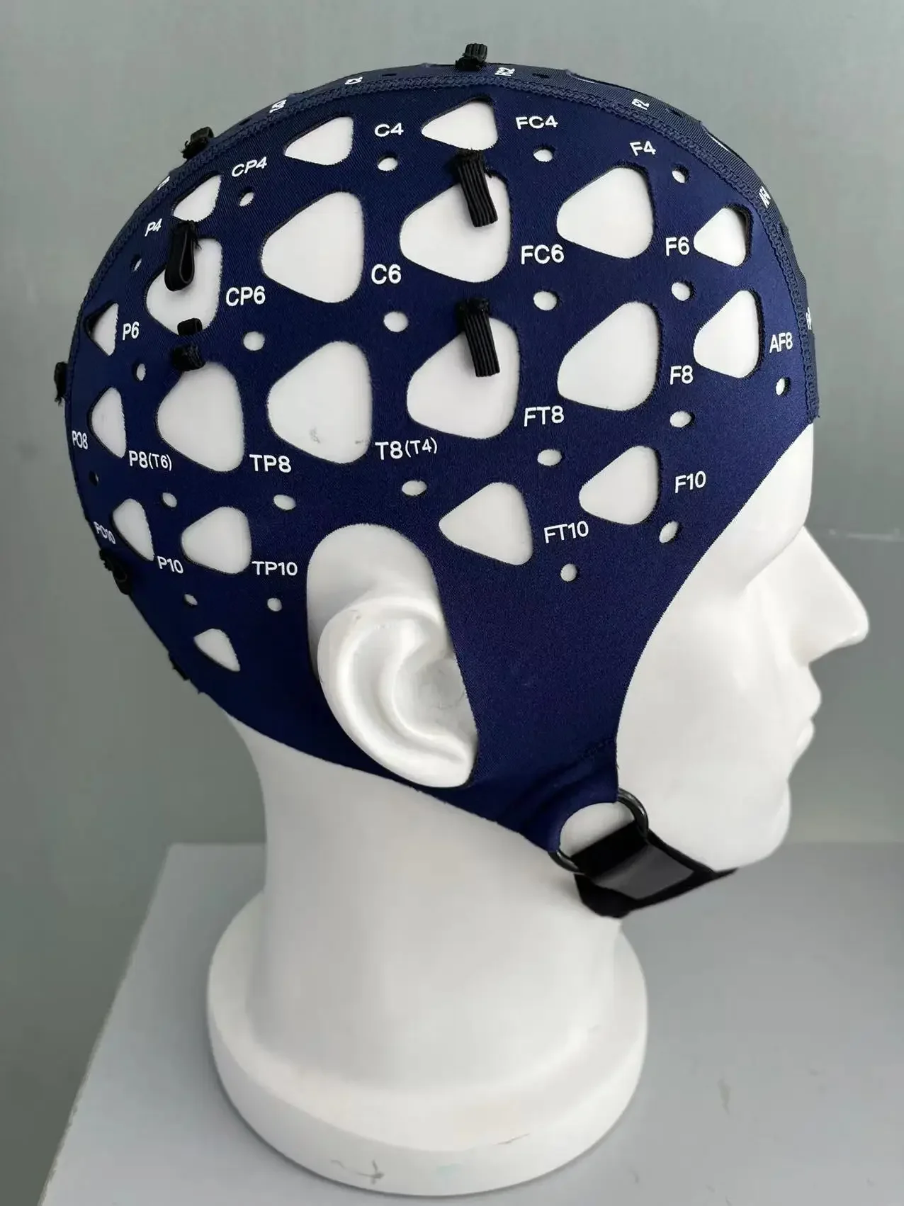 Greentek Textile cap without electrodes for non-invasive EEG registration