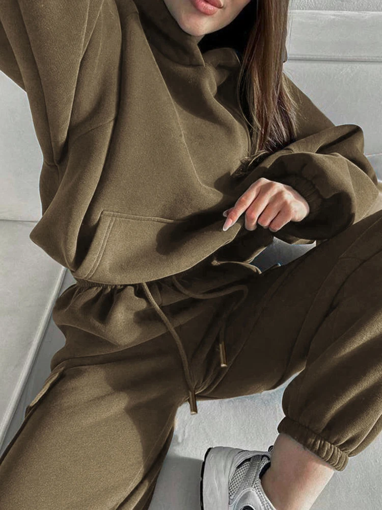 Autunno 2025 set con cappuccio sportivo casual da donna nuovo Felpe con cappuccio tascabili a maniche lunghe tinta unita Pantaloni da lavoro con lacci Set da due pezzi da donna