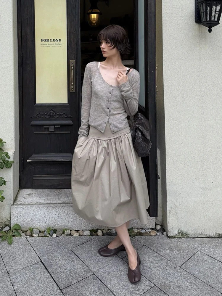 Threaded waist elastic spliced A-line skirt, A new style of 2026 autumn, simple and casual women's half skirt