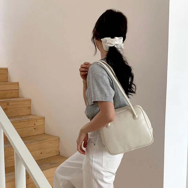 

European and American women's simple retro niche box armpit bag long hand-held small square bag bowling pillow shoulder bag