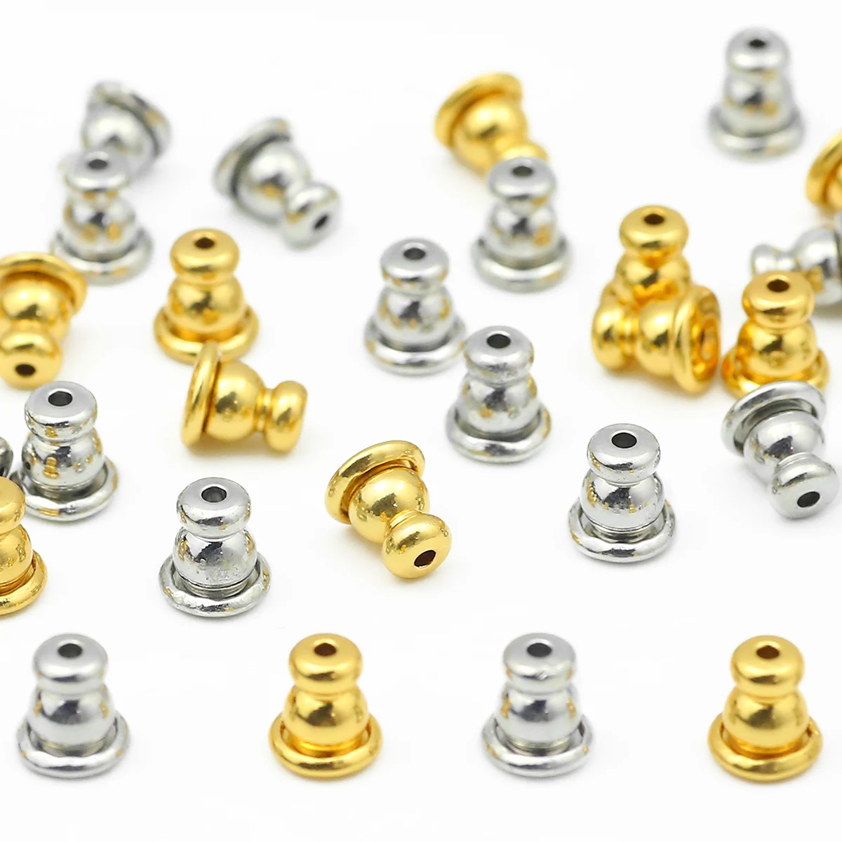 6×5mm goldene silbrige Messing Pagode Silikon Ohrstöpsel lose Ohrrückseite Ohrringkappen für Schmuckherstellung Ohrringe DIY Zubehör