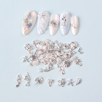 TSZS 50pcs/bag Ocean Starfish Shell Nail Art Charms Silver Beach Starfish Sea Seashell Nail Decoration Metal 3D Charms for Nail
