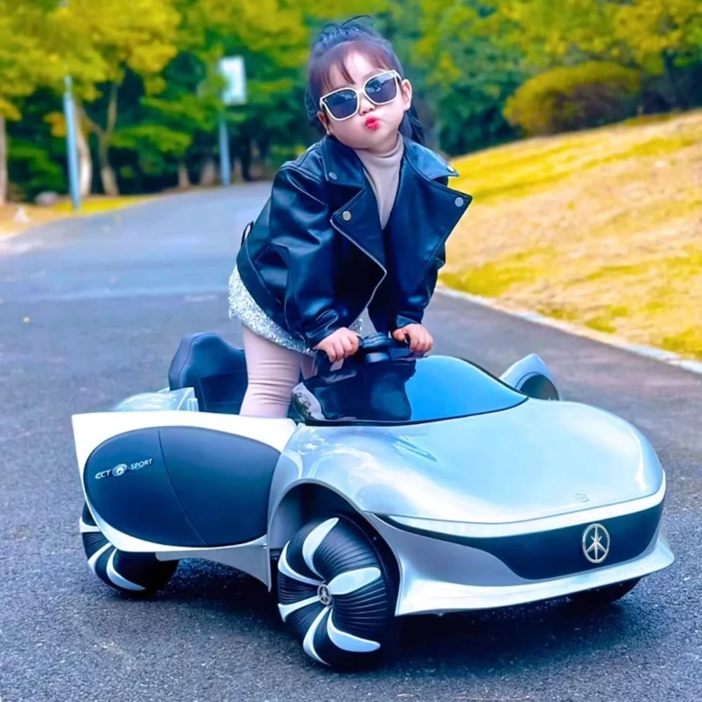 

Электромобиль для детей 4WD с пультом управления - игрушечный автомобиль на батарейках с дверями, LED-подсветкой и музыкой