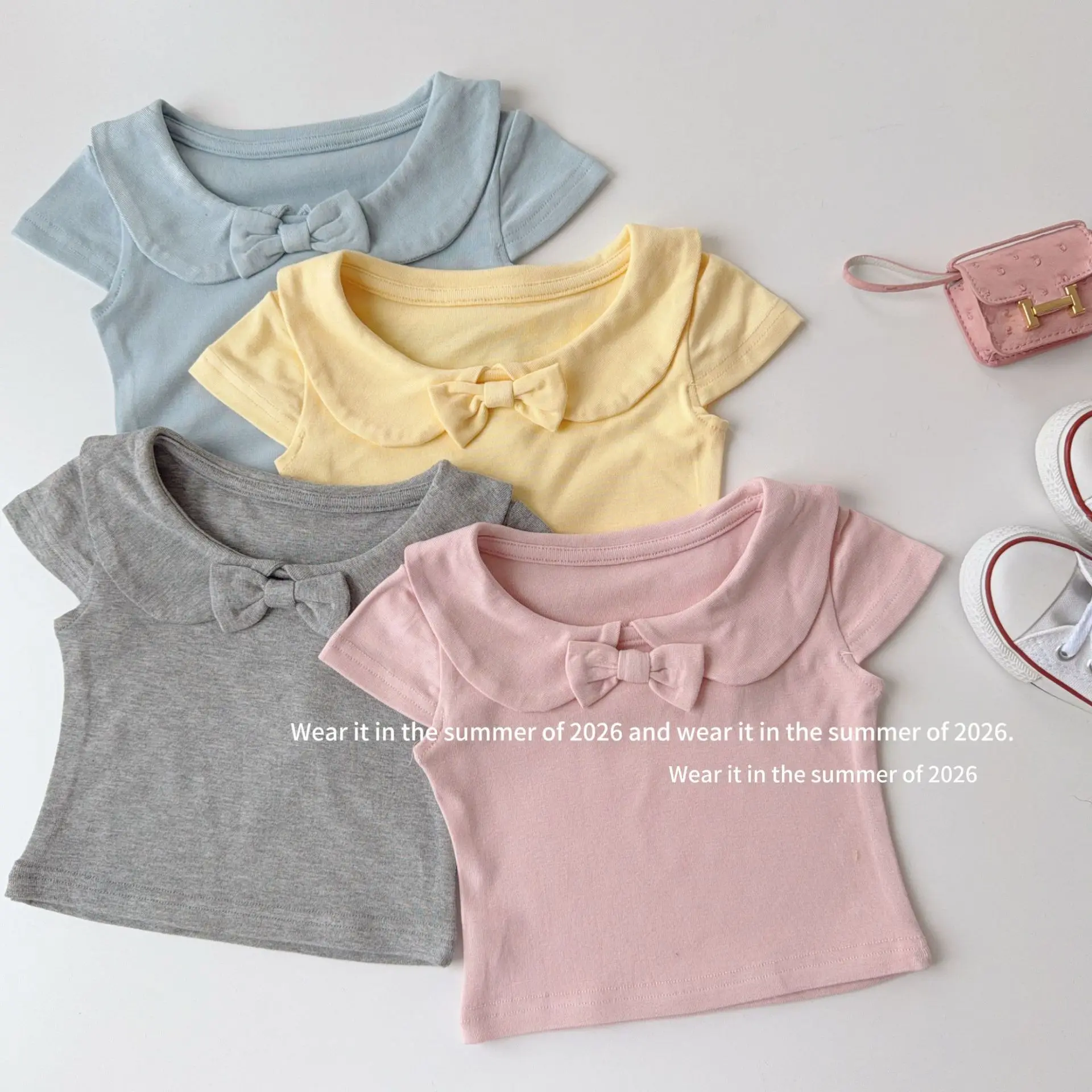 

Girls Summer Solid Color Bow Cute 2026 Cotton T-shirt Fashion Casual Baby Solid Top