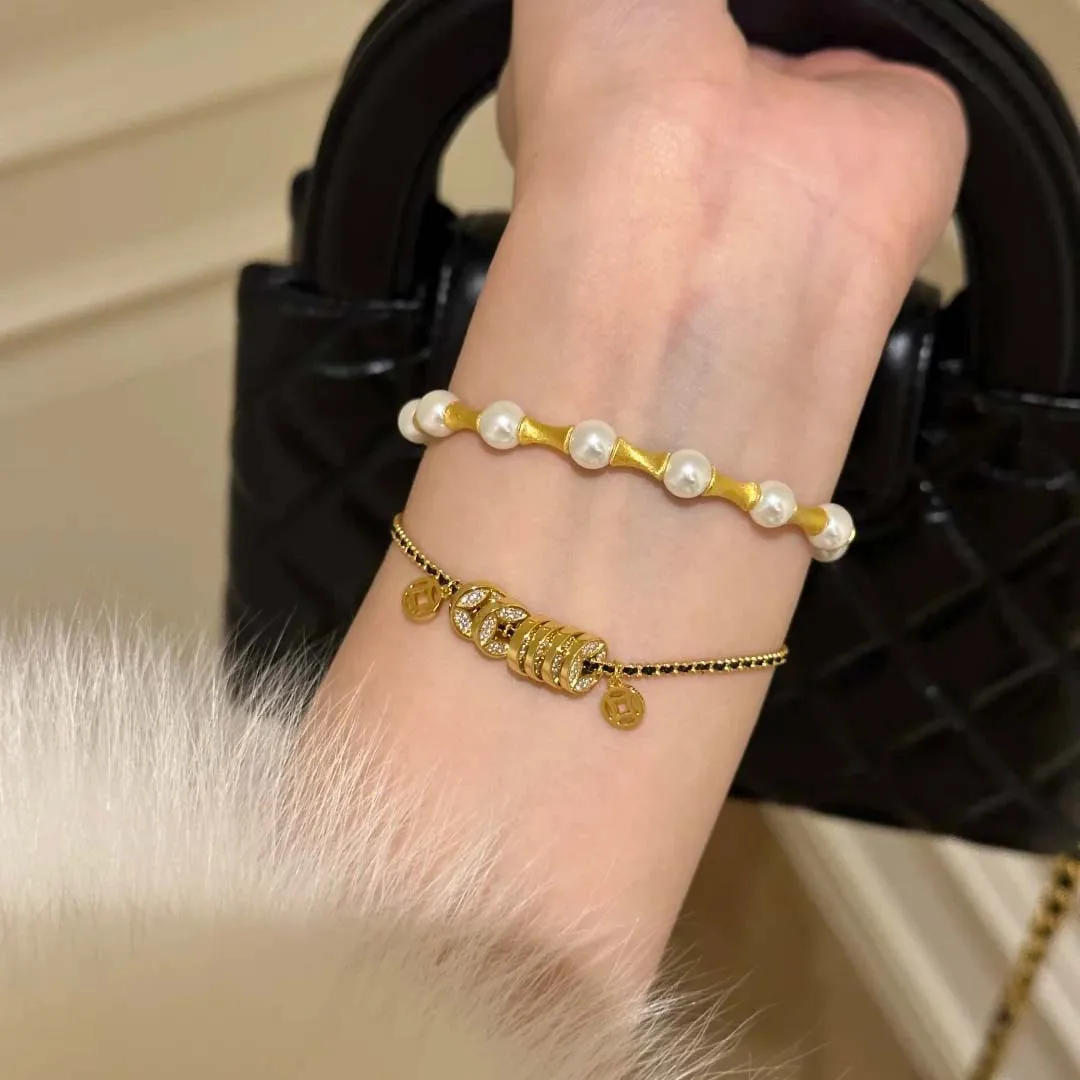9999 gold coin bracelet with string. Elegant and luxurious style for women. Versatile and suitable for all occasions.