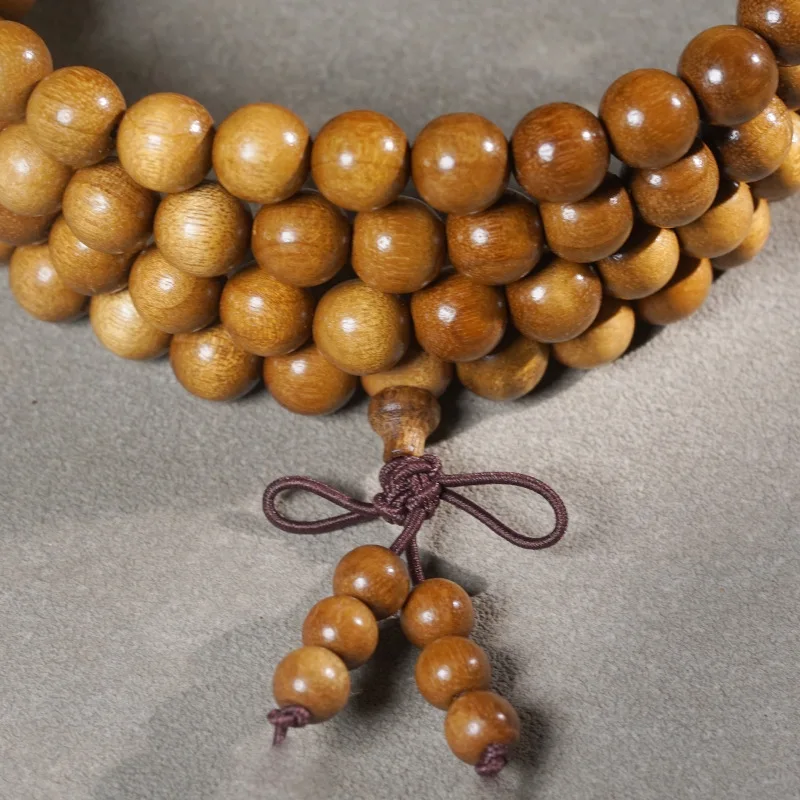 Golden wood bracelet with 108 beads, gold-threaded cat-eye small-leaf nanmu, high-end men's and women's cultural accessory