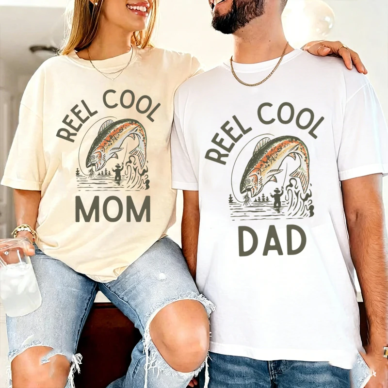 

Reel Cool Dad Mom Fishing Couple Matching T-Shirts His and Hers Matching Outfits Short Sleeve Women Men Tees Anniversary Gifts