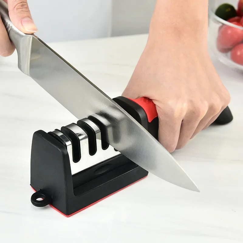 Afilador de cuchillos de cocina de 4 segmentos, piedra afiladora negra multifuncional de mano de tres usos para el hogar
