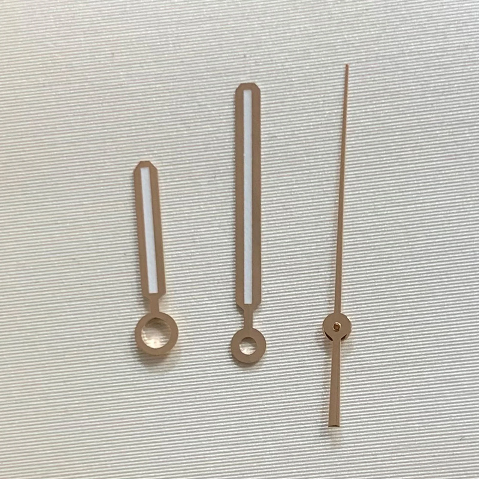 عقارب ساعة مضيئة باللون الأخضر لحركة NH35 مؤشرات ساعة فضية/وردية لساعة اليد ذات الطلب 31.8 مللي متر جزء معدل