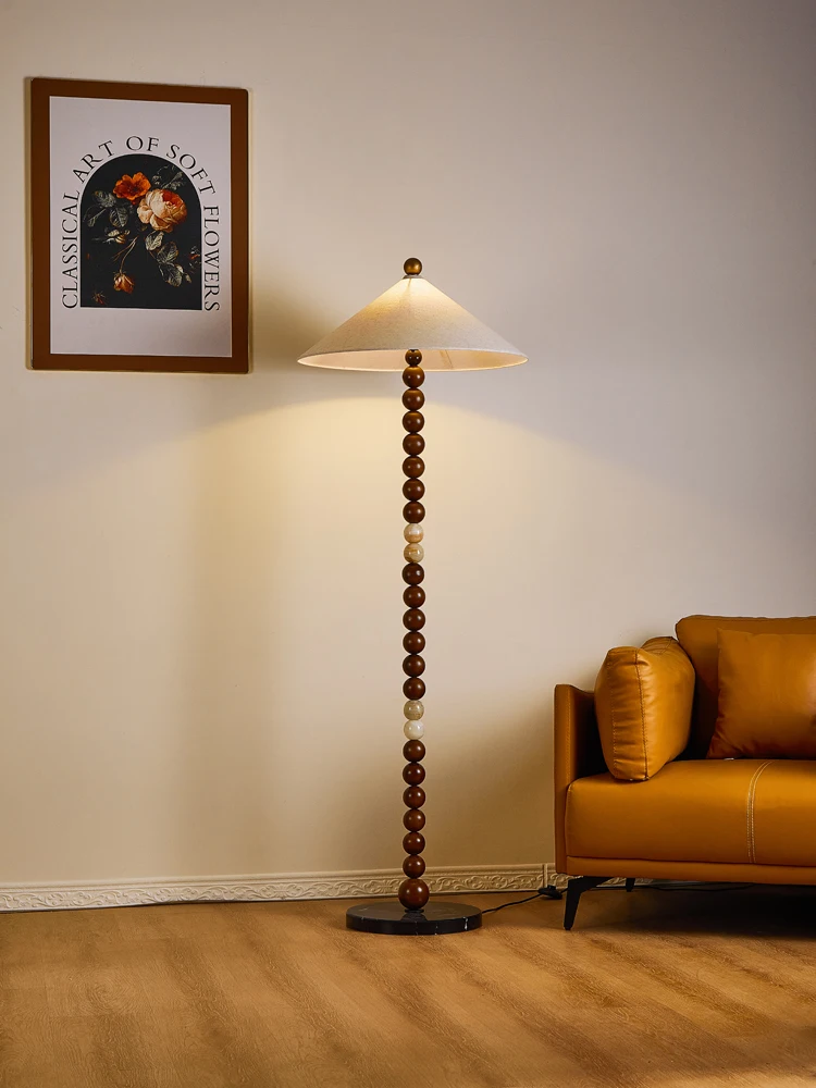 

French medieval living room sofa next to the high-end atmosphere light