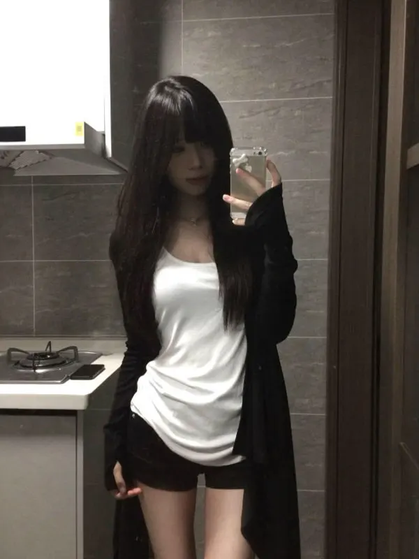 

Black Minimalist Women's Outfit Trendy Unique Two-Piece Set Comfortable Long Sleeve round Neck Sweater And Tank Top Combo