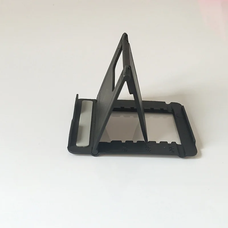 

Складная подставка для мобильного телефона, миниатюрная, регулируемая, креативная, портативная, универсальная, складная пластиковая подставка для телефона, подставка для планшета и компьютера