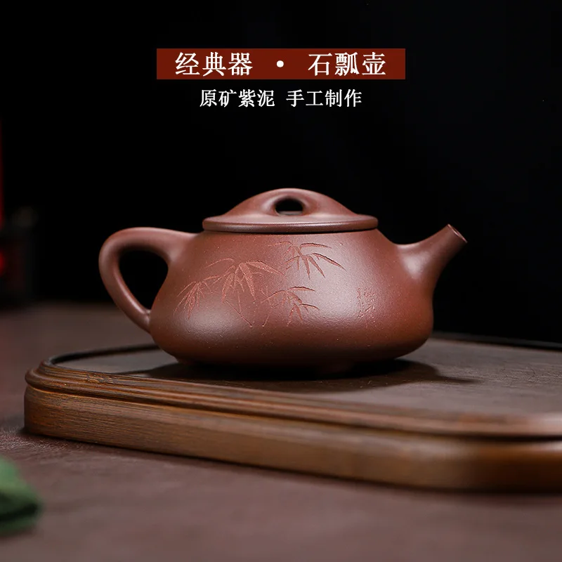 Manufacturer wholesale Yixing handmade raw ore purple clay pot all hand-carved purple mud Jingzhou stone scoop household teapot