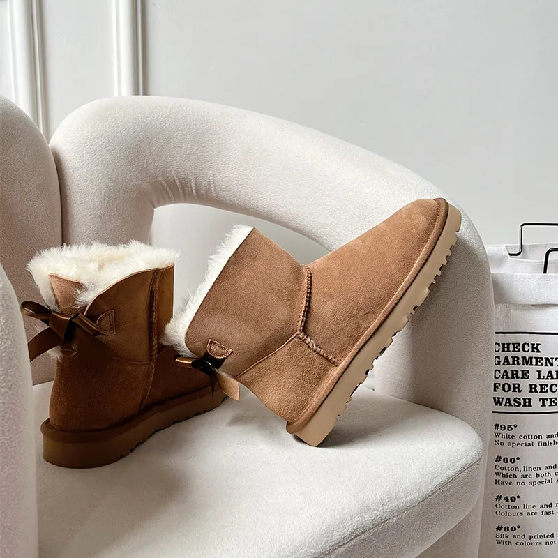 Low end ribbon style 2026 new warm women's snow boots, genuine leather cotton boots, sheep fur integrated short tube snow boots