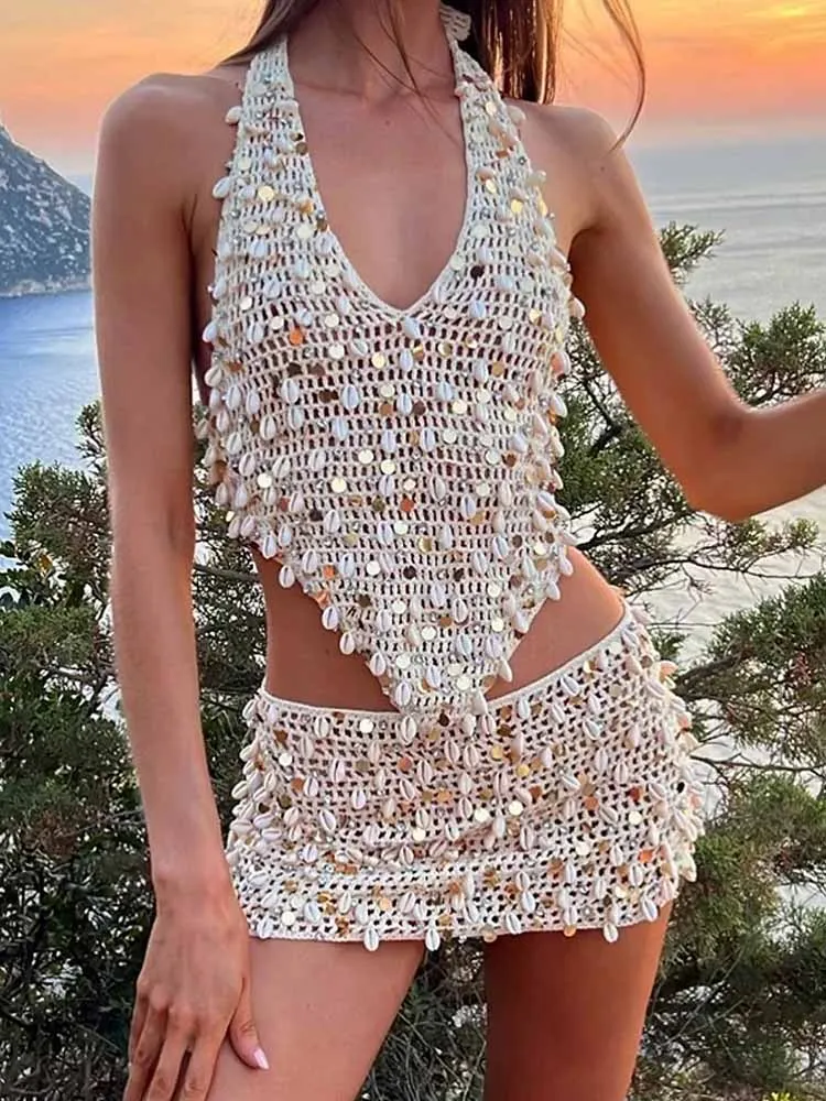 BKQU الترتر مثير الجوف خارج الكروشيه تنورة مجموعات النساء الرسن الدانتيل يصل عارية الذراعين شل القمم التنانير الصغيرة 2025 الصيف شيك الشاطئ البدلة
