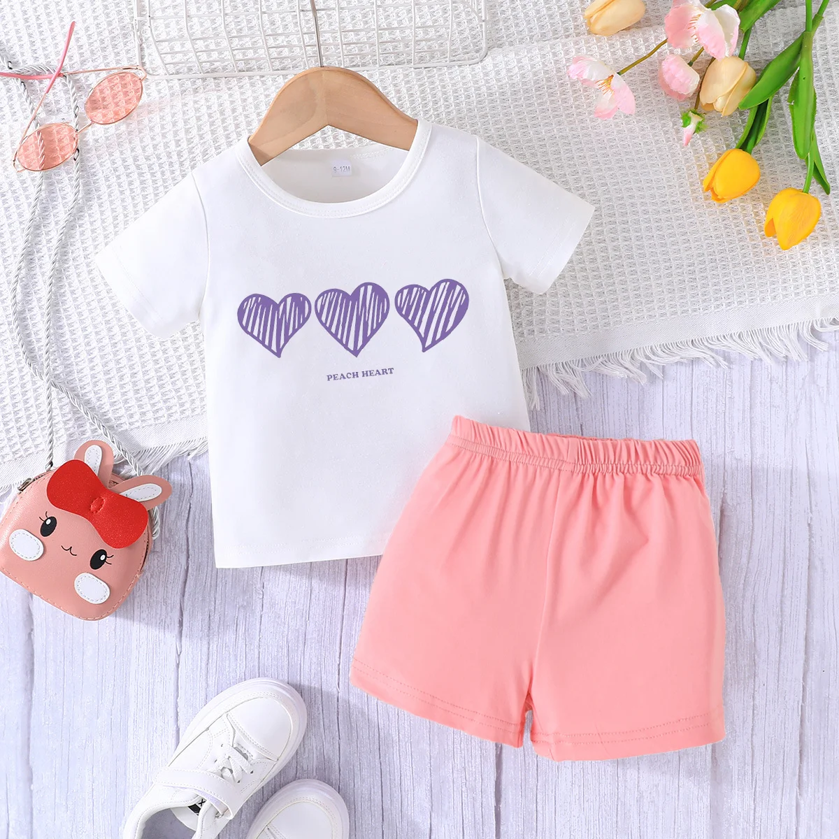 Summer's latest white short sleeved T-shirt for both boys and girls, round neck pullover+pink shorts set ﻿