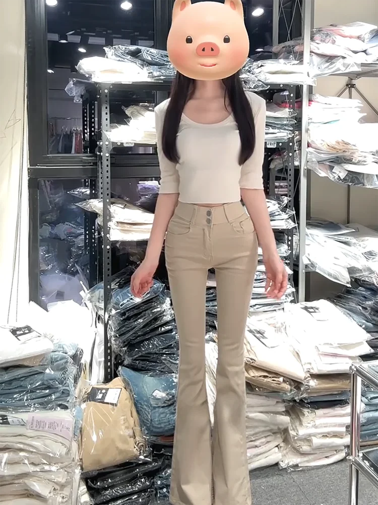 

High Waist Flared Jeans Women's Spring New Style Elastic Butt Lifting Long Pants Korean Milk Tea Color Hip Enlarging Pants