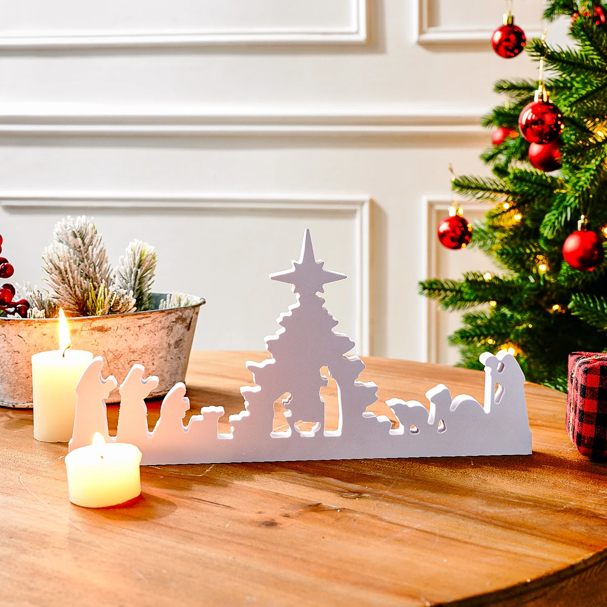 A creative and simple white Nativity silhouette decorative item, a white snowflake board Christmas home desktop decorative item