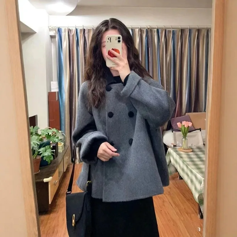 The New Winter Grey Woolen Coat for Women Is Unique and Super Beautiful. It's A Thick Short Fashionable and Simple Women's Wear