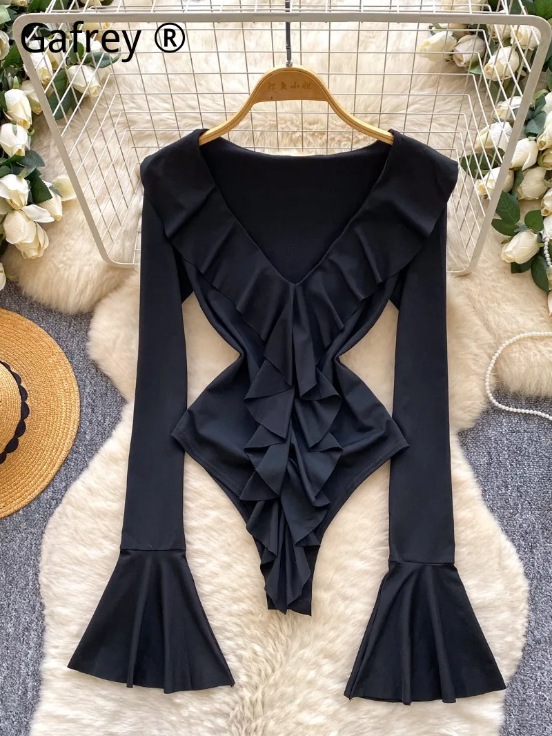 French New Black Ruffle Bodysuit Women 2026 Spring Sexy Deep V-Neck Flare Sleeve Top Office Lady Long Sleeve Romper