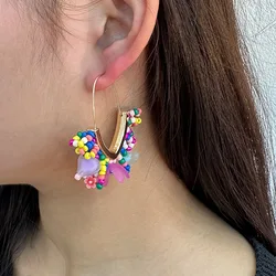 Resort Ins wind original design exaggerated V-shaped flower ear buckle hand-woven earrings simple ear accessories