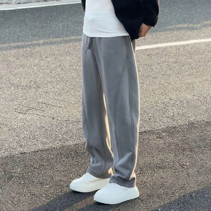 

Мужские повседневные брюки-бананы из плотной ткани на осень-зиму, свободные, драпированные, с широкими штанинами, визуально стройнящие, длиной в пол