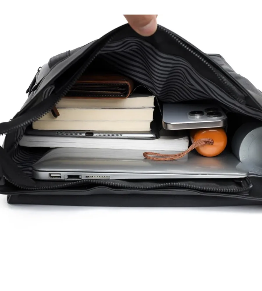 Modern fold-over backpack blends sleek style with roomy storage for students and professionals