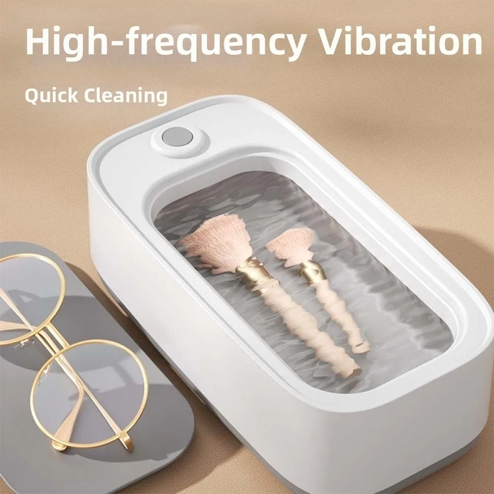 آلة تنظيف النظارات عالية التردد بزر واحد 360 °   آلة إزالة بقع المجوهرات المحمولة القابلة لإعادة الشحن