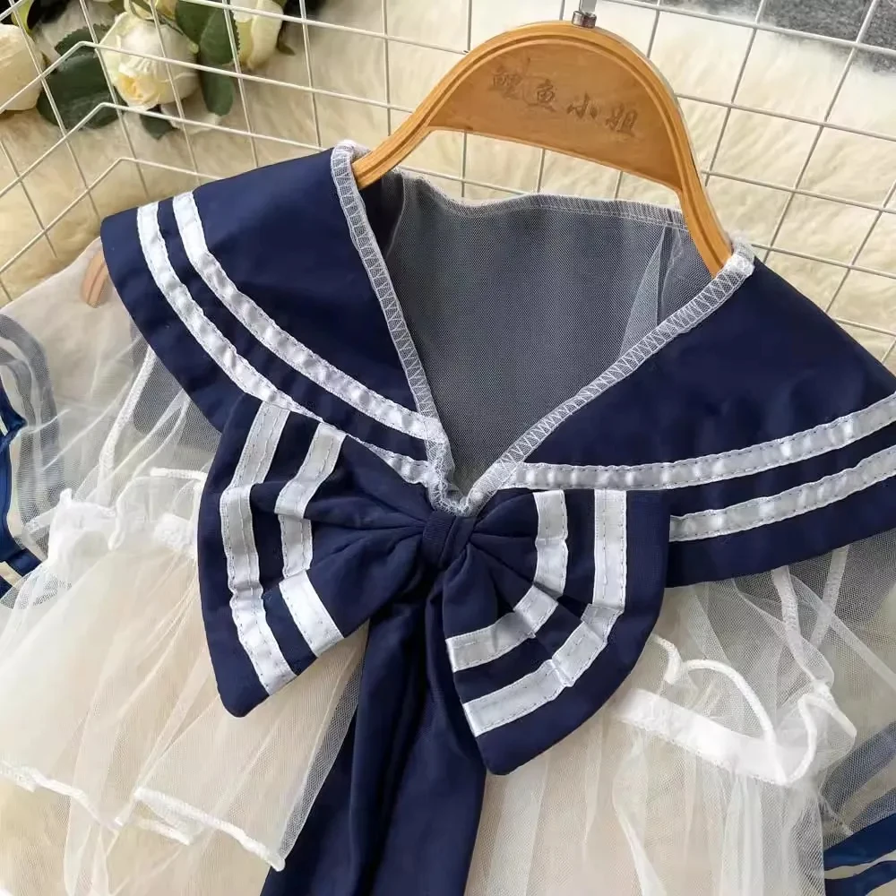 Women\'s Sexy Transparent Sailor Student Uniform Cosplay Costume with Sheer Bowknot Stripe Patchwork Top + Mini Skirt 2-Piece Set