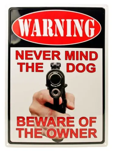 Never mind the dog beware of the owner  Tin Sign 8 x 12