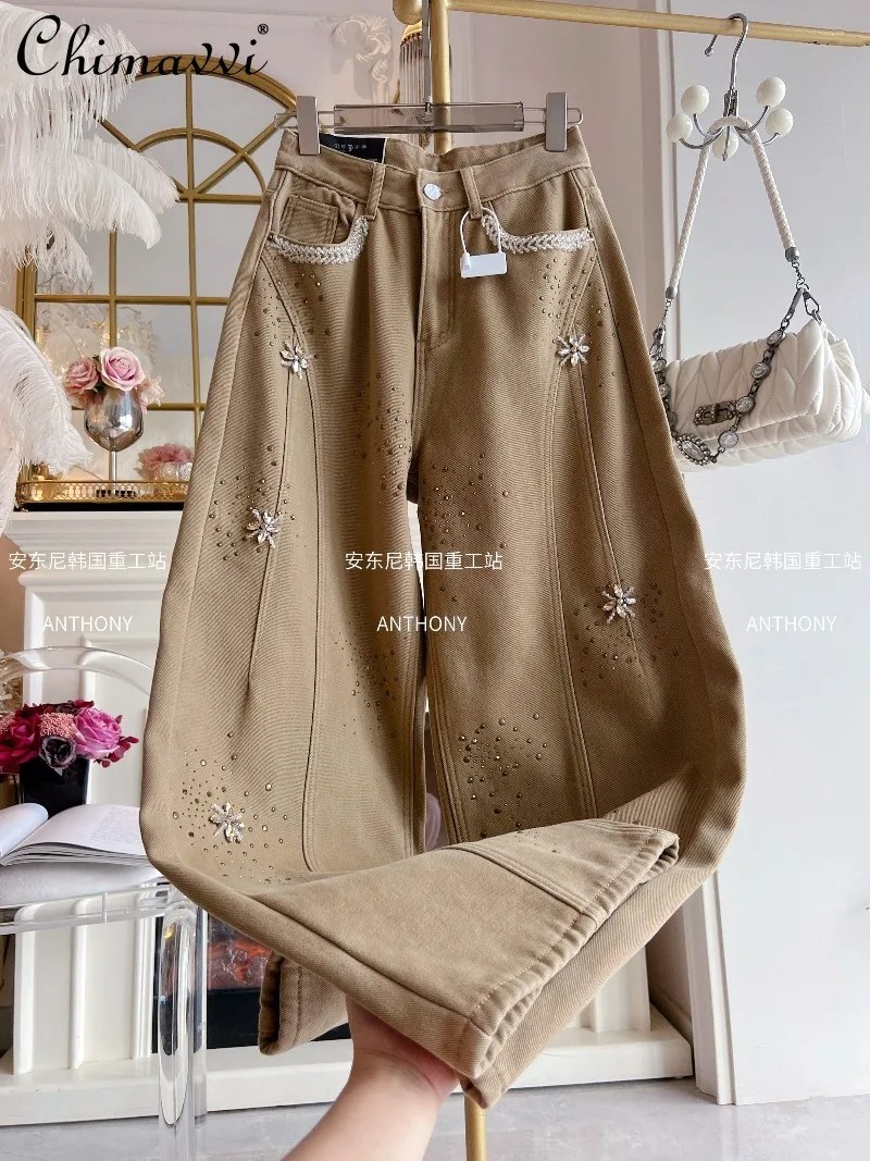 سراويل أبي سميكة مبطنة بالصوف للنساء ملابس شتوية 2025 جينز ريترو جديد ثقيل من حجر الراين عالي الخصر للتخسيس