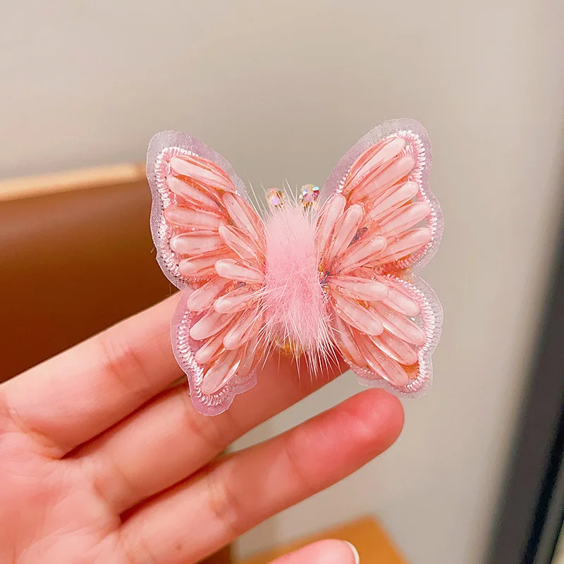 Children\'s Hair Clip With A Moving Butterfly Cute Pink Plush Ball Little Girl Hair Accessories Gold Color Banger Clips Hairpins