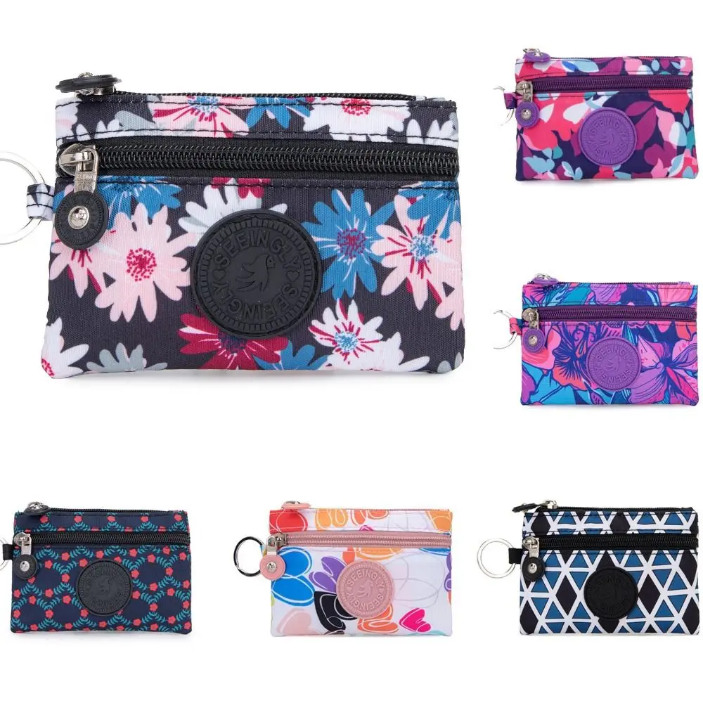 กระเป๋าใส่เหรียญผ้าแคนวาสแบบใหม่พร้อมพวงกุญแจ ลายดอกไม้ ช่องใส่บัตร กันน้ำ ทนทานต่อการสึกหรอ สำหรับผู้ชายและผู้หญิง
