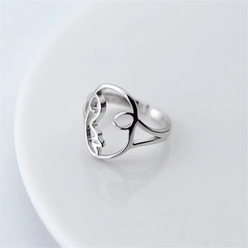 New Creative Popular Hollow Face Shaped Fashion Jewelry 925 Sterling Silver Personality Delicate Asymmetric Opening Rings  R256