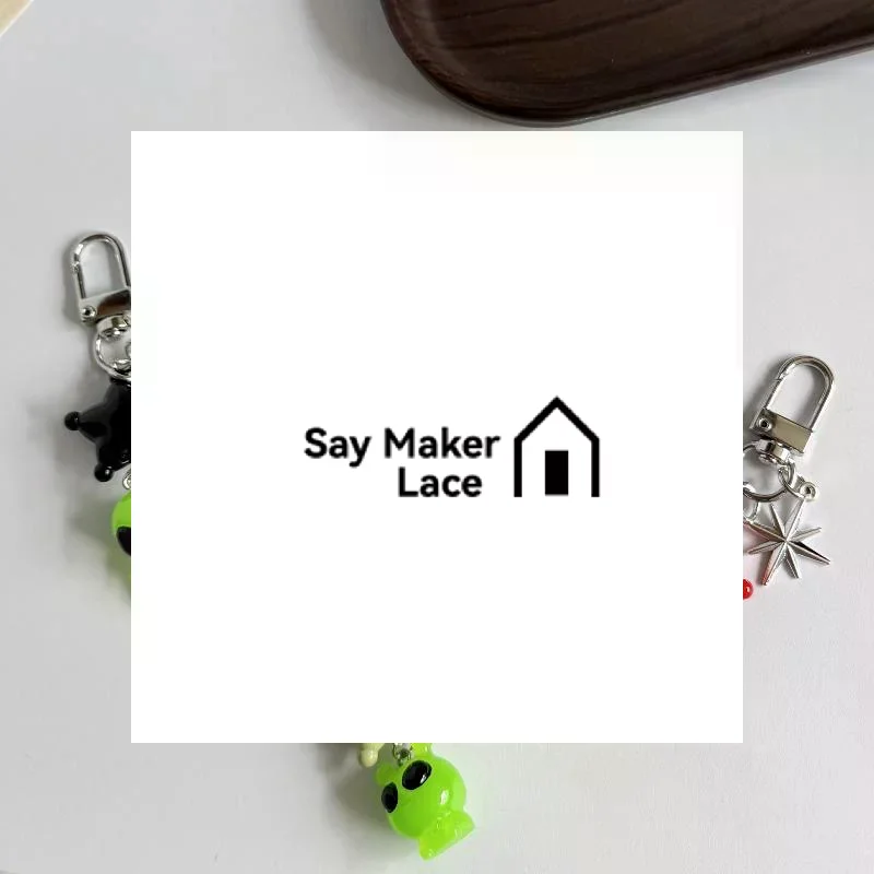 Cute Big Eyes Alien Keychain Headphone Bag Pendant Bag Charm Backpacks Purses Pendant Party Gift Creative Small Pendant