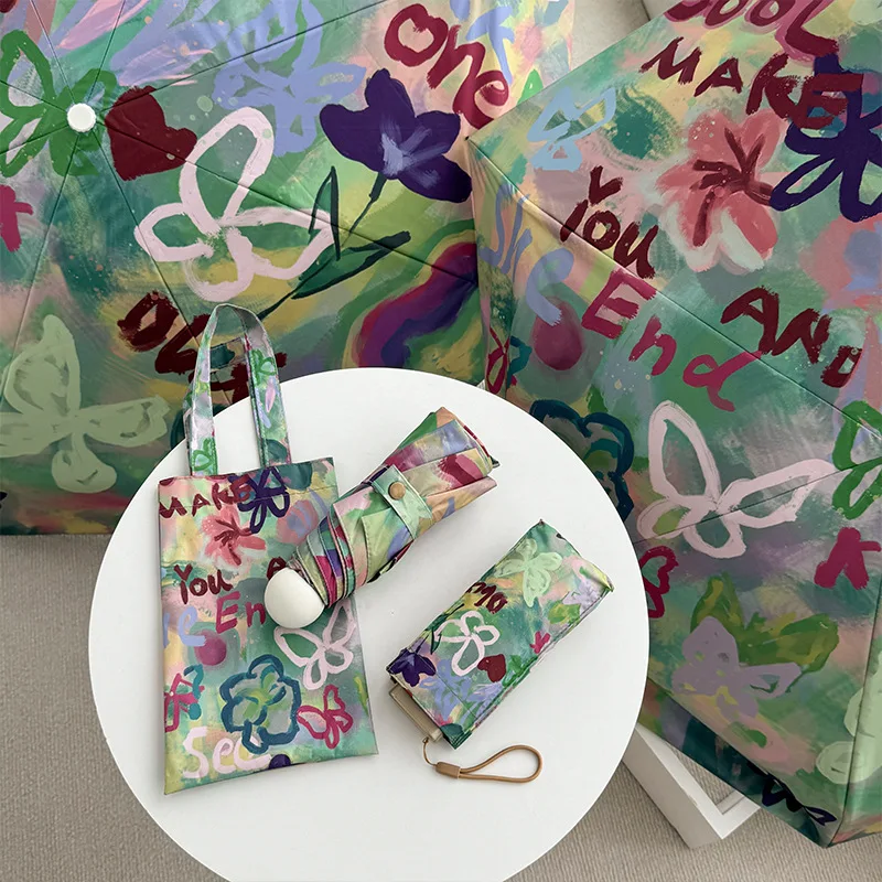 

Mini Graffiti Sun Umbrella Compact and Portable Sunscreen and UV Protection Sand Three/Five/Six Folding Umbrella for Rain